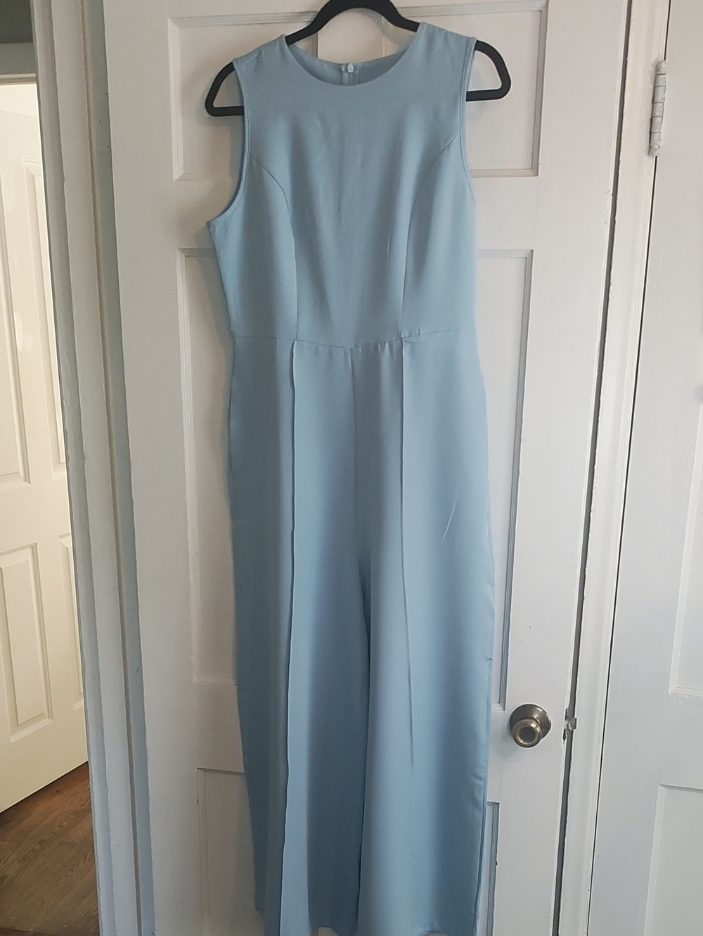 Unknown brand new with no tags Light Blue Sleeves Less Jumpsuit.